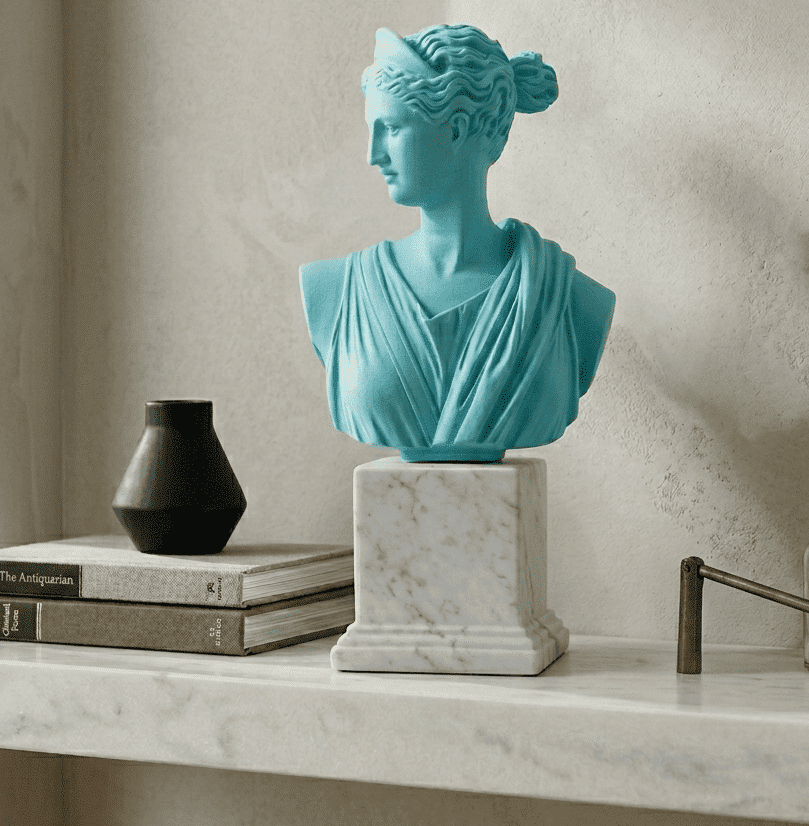 artemis bust greek statues in shelf